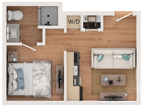 A top down view of a living room with a couch, coffee table, and a kitchen area.